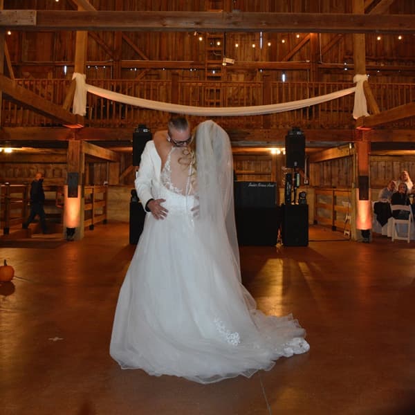 Wedding guests celebrating beneath professional event lighting — gallery photo 42