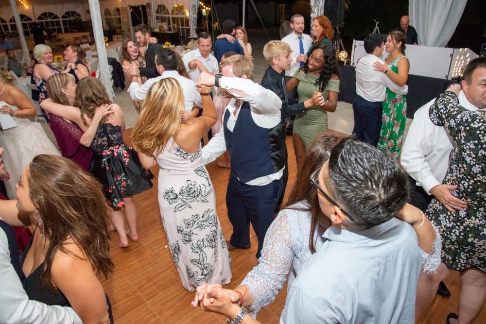 Couple sharing a dance at a BT Sound wedding reception — gallery photo 38