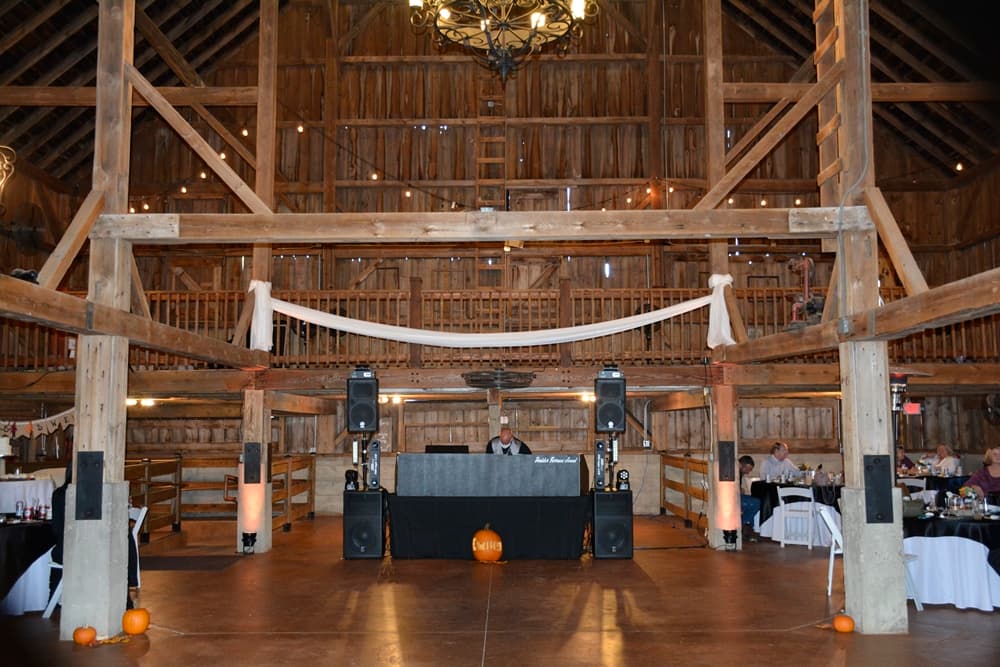 Professional BT Sound mobile DJ setup at a rustic Northern Illinois wedding venue